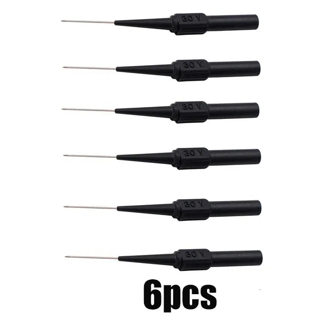 Six pieces of multimeter back-piercing test probes with needle tips shown in a row.