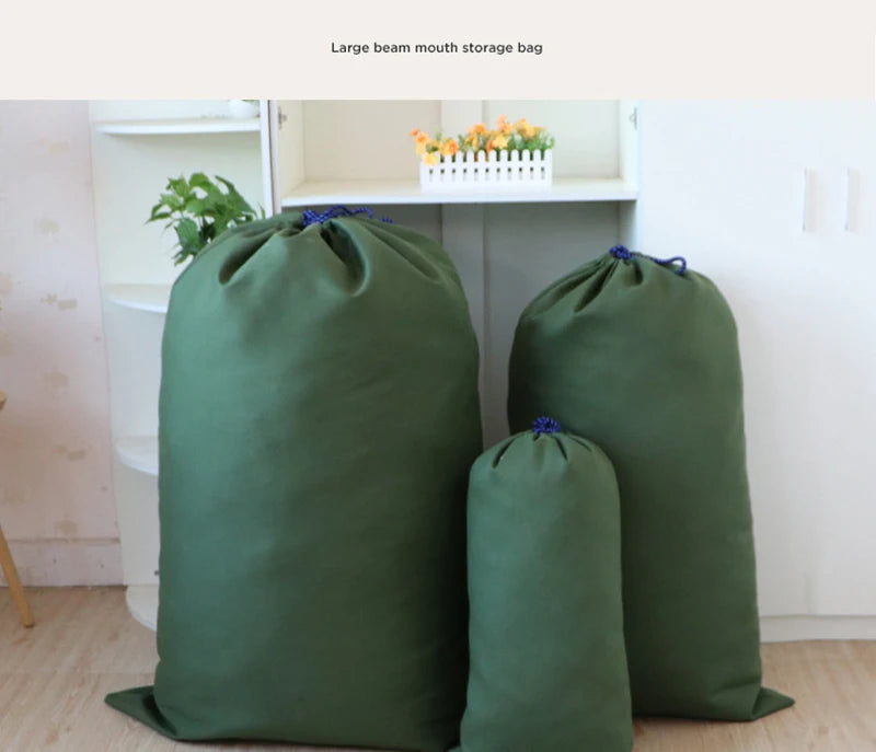 A large, olive green canvas storage bag with a drawstring closure is displayed on a shelf.