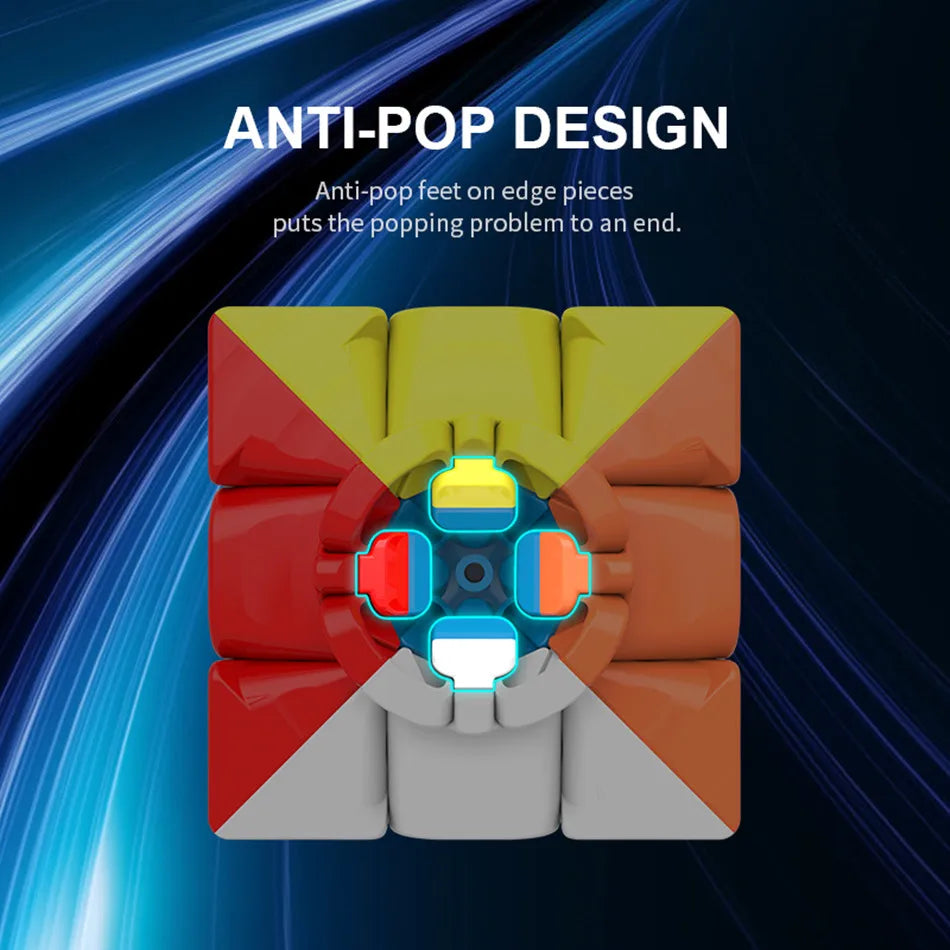 A close-up view of a red and yellow cube with anti-pop feet, showing the edge pieces and center mechanism.