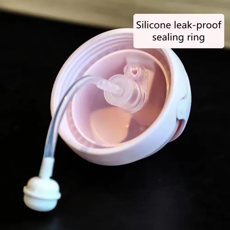 A silicone leak-proof sealing ring is shown inside a pink cup with handles.