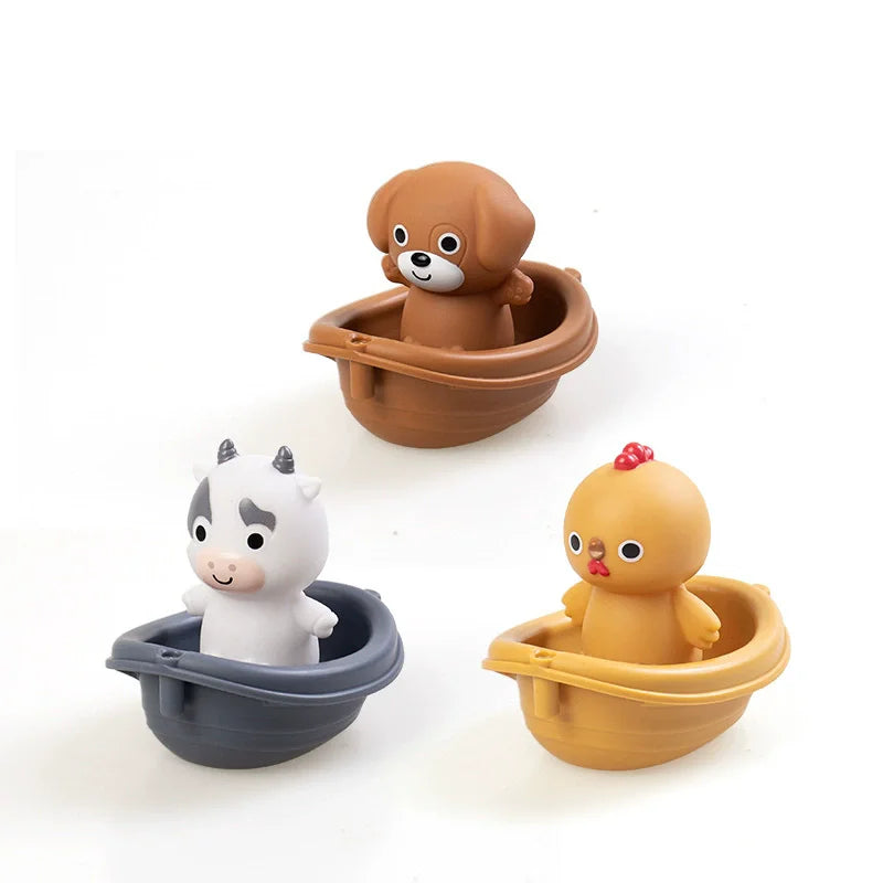 Three silicone animal finger puppets in brown and white colors are shown with small bath cups.