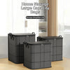 Three large gray fabric storage bags are displayed on a wooden floor next to a glass cabinet.