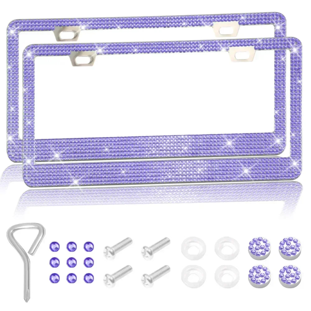 A pair of purple crystal rhinestone license plate frames with screw caps and mounting hardware.
