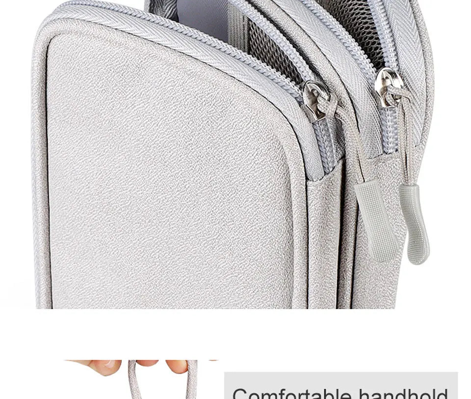 A close-up view of a light gray waterproof nylon cable organizer travel case with a zipper closure.