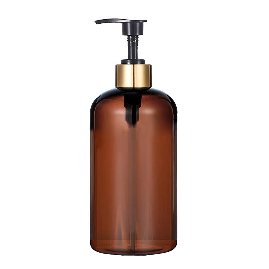 A brown glass refillable soap dispenser bottle with a gold pump top.