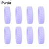 A set of purple silicone luggage wheel protectors designed to prevent scratching and reduce noise during travel.