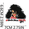 Black embroidered patch featuring a woman with curly hair smiling and text that reads Smile like a Delta Girl