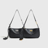 Black classic leather tote bag with gold-tone metal buckle and long straps