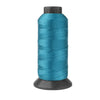 A spool of teal blue heavy-duty nylon sewing thread for upholstery and denim.