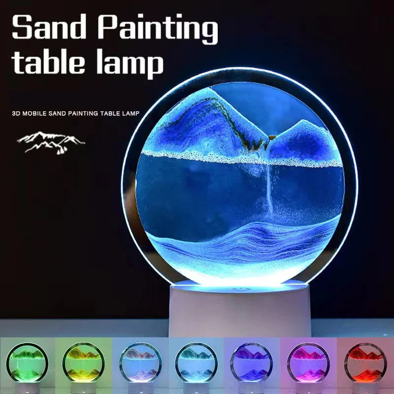 A round table lamp displaying a vibrant blue sand painting landscape with various color options.
