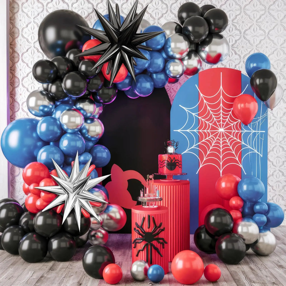 A balloon garland arch featuring blue, red, and black balloons arranged in a festive display.
