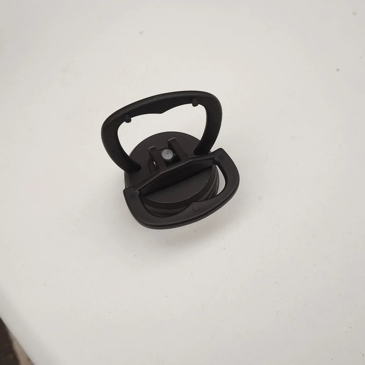 A black car dent puller kit with a handle lift and power remover tool.