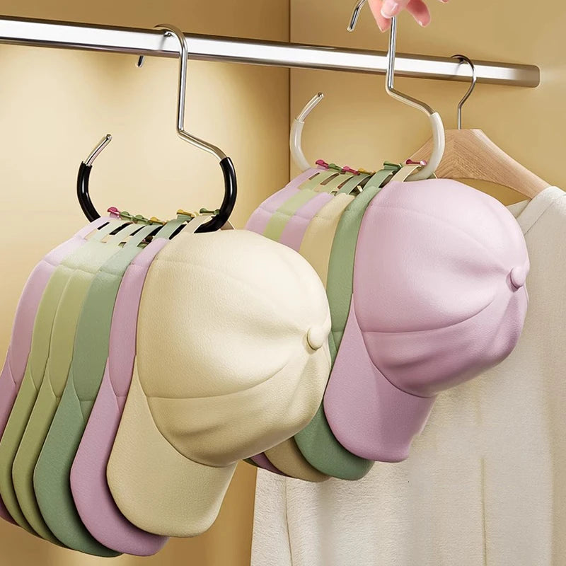 A display of rust-resistant steel round hanger hooks holding various colored hats and bags.