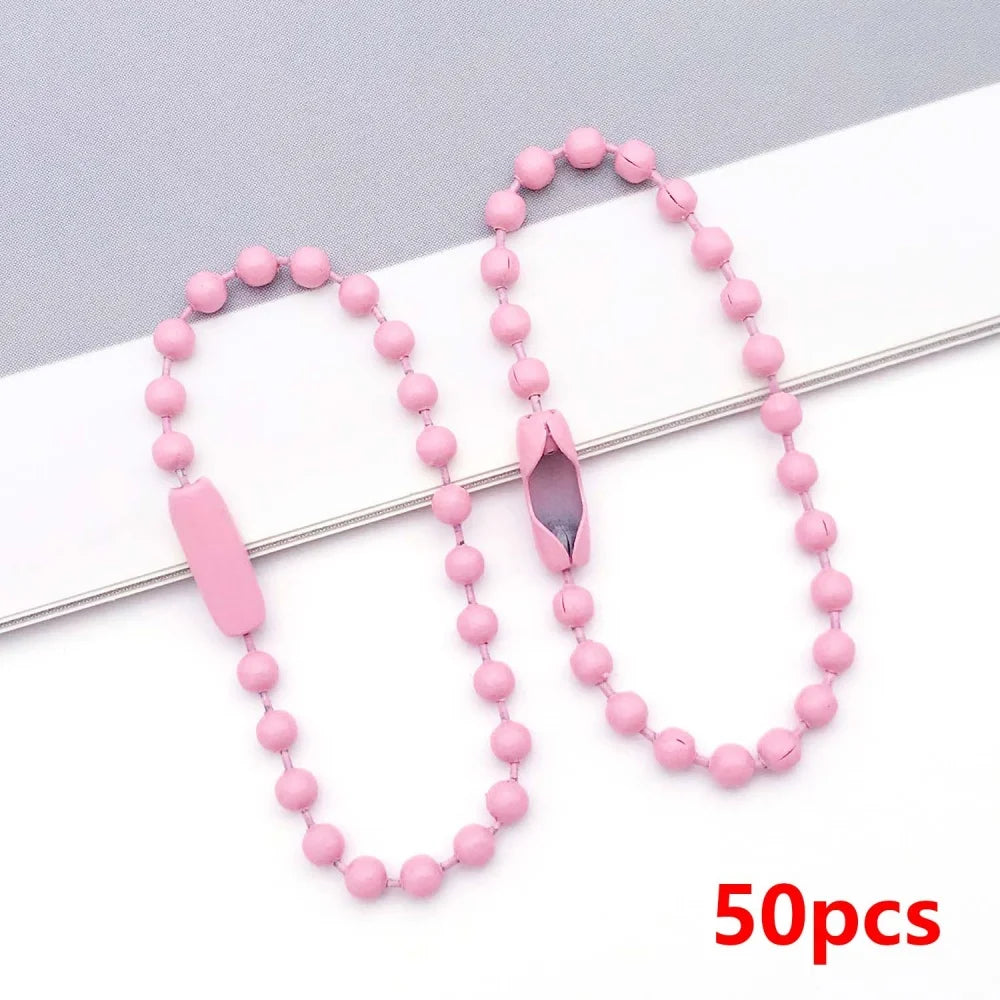 A set of 50 pink ball bead chains for keychains and jewelry making displayed on a white background.