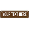 A brown rectangular metal sign with the text YOUR TEXT HERE engraved on it.