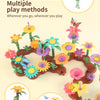 A colorful wooden flower garden building toy featuring various flowers and plants for play.