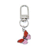 Silver keychain charm featuring a pink and red butterfly