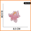 Pink embroidered flower patch resembling a rose or butterfly, measuring 8.5 cm wide.