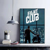 A framed poster of the Fight Club movie title in white text against a dark blue background.