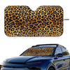 Leopard print car windshield sunshade placed on a blue car.