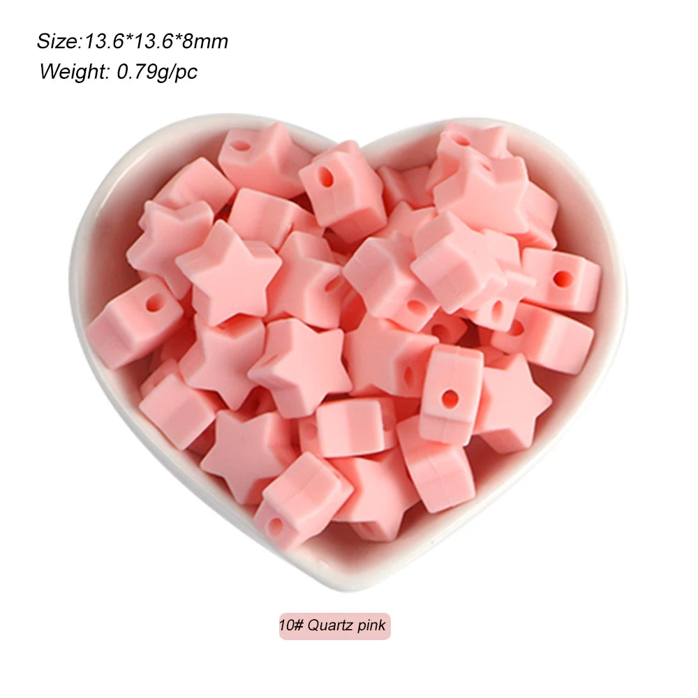 A pile of pink silicone star heart beads for DIY jewelry making