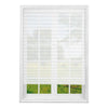 White pleated paper window blind installed in a white frame, showing a light translucent shade.