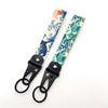Hokkaido Wave JDM keychain featuring a Kanagawa surf design with blue and green patterns