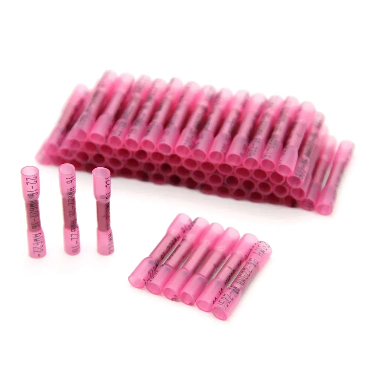 A row of pink insulated waterproof heat shrink butt connectors for 22-16 AWG wires.