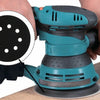 A hand is holding a teal foam sanding pad with visible holes, demonstrating the product for random orbit sanders.