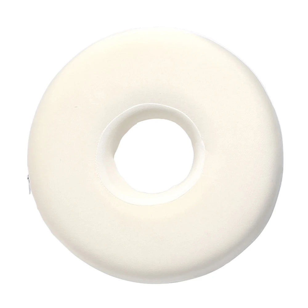 White memory foam ear piercing pillow with a central cutout for side sleepers