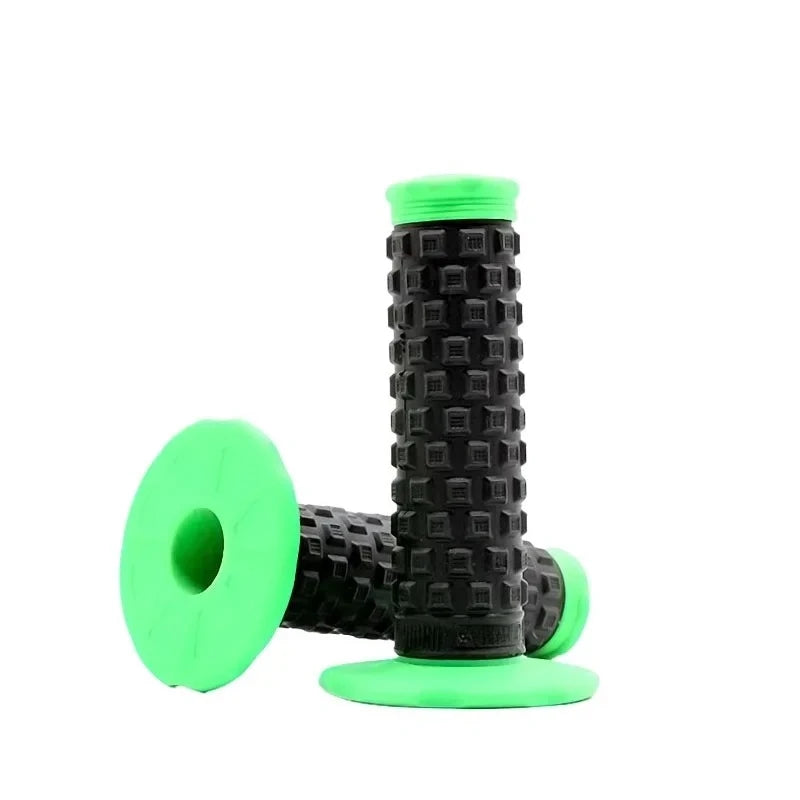 A green motorcycle pillow top grip with a black textured handle is shown.