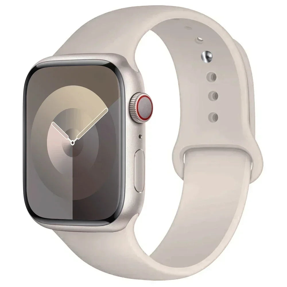 A light beige silicone sport band for an Apple Watch shown on a white background.