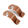 A pair of brown universal car seat headrest hooks for securing seats.