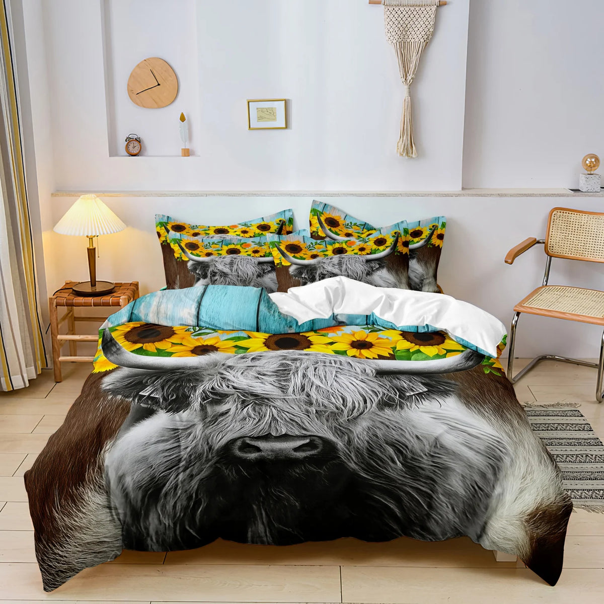 Highland cow print bedding set featuring a duvet cover and pillowcases displayed on a bed.