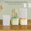 A set of silicone baby bottle brushes in light green and beige are displayed on a wooden surface.