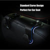A close-up of a black car seat headrest with installed curve design hooks and blue LED lighting.