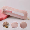 A pink clear waterproof travel makeup organizer pouch with a leather trim shown from the side and close-up details.