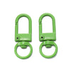 A pair of bright green alloy lobster clasp hooks for DIY jewelry making.