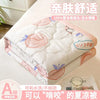 A stack of white and pink quilted blankets or quilts for summer comfort
