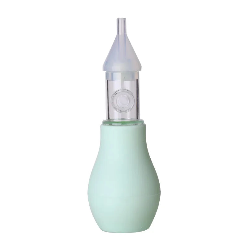 A light green baby nasal aspirator device with a clear silicone tip.