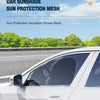A white car side window fitted with a dark sun protection mesh for insulation and shade.