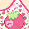 A pink and white baby bib featuring a heart design and strawberry prints.