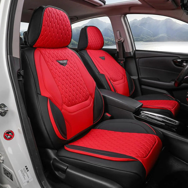 Red and black quilted leather car seat covers installed in a vehicle interior.