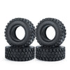 A pair of black rubber mud terrain tires for Axial SCX24 and TRX4M