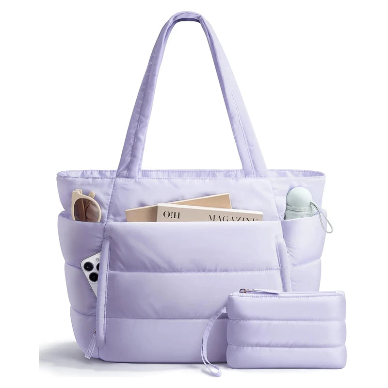 A light purple quilted puffy tote bag with a laptop sleeve and a matching zippered pouch.