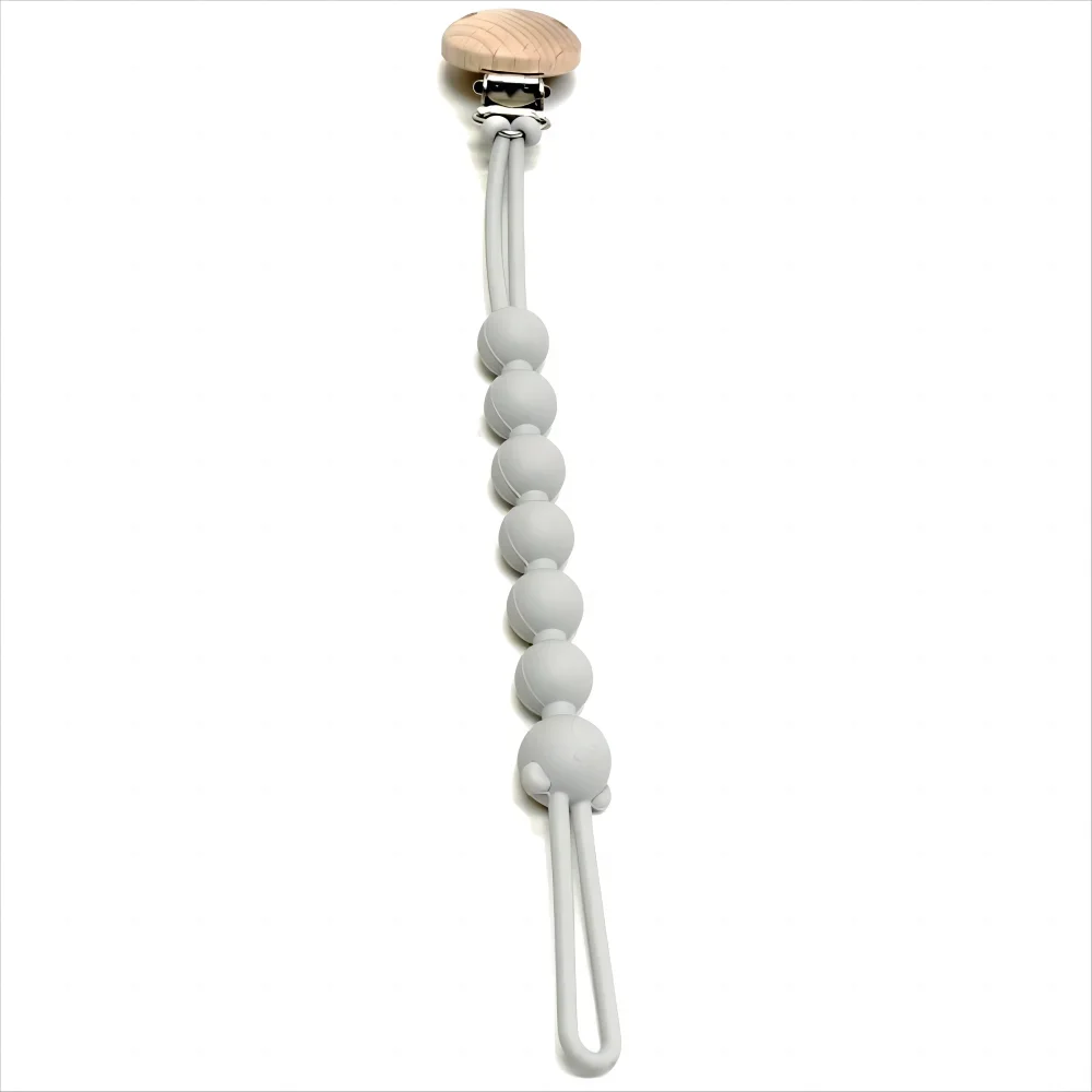 A silicone pacifier clip with an anti-lost chain and a wooden top.