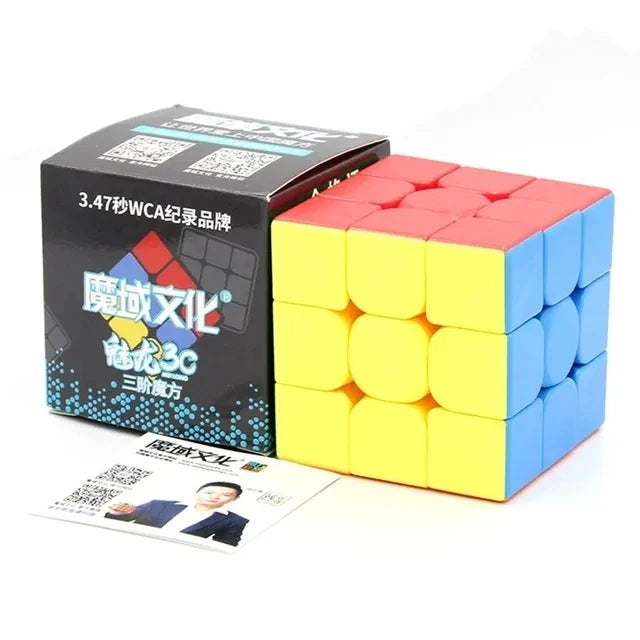 A box of Meilong Alien Speed Cube puzzle blocks in red, yellow, and blue colors.