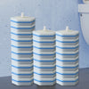 Three stacked white cleaning pads with blue accents for disposable toilet cleaning wand refills