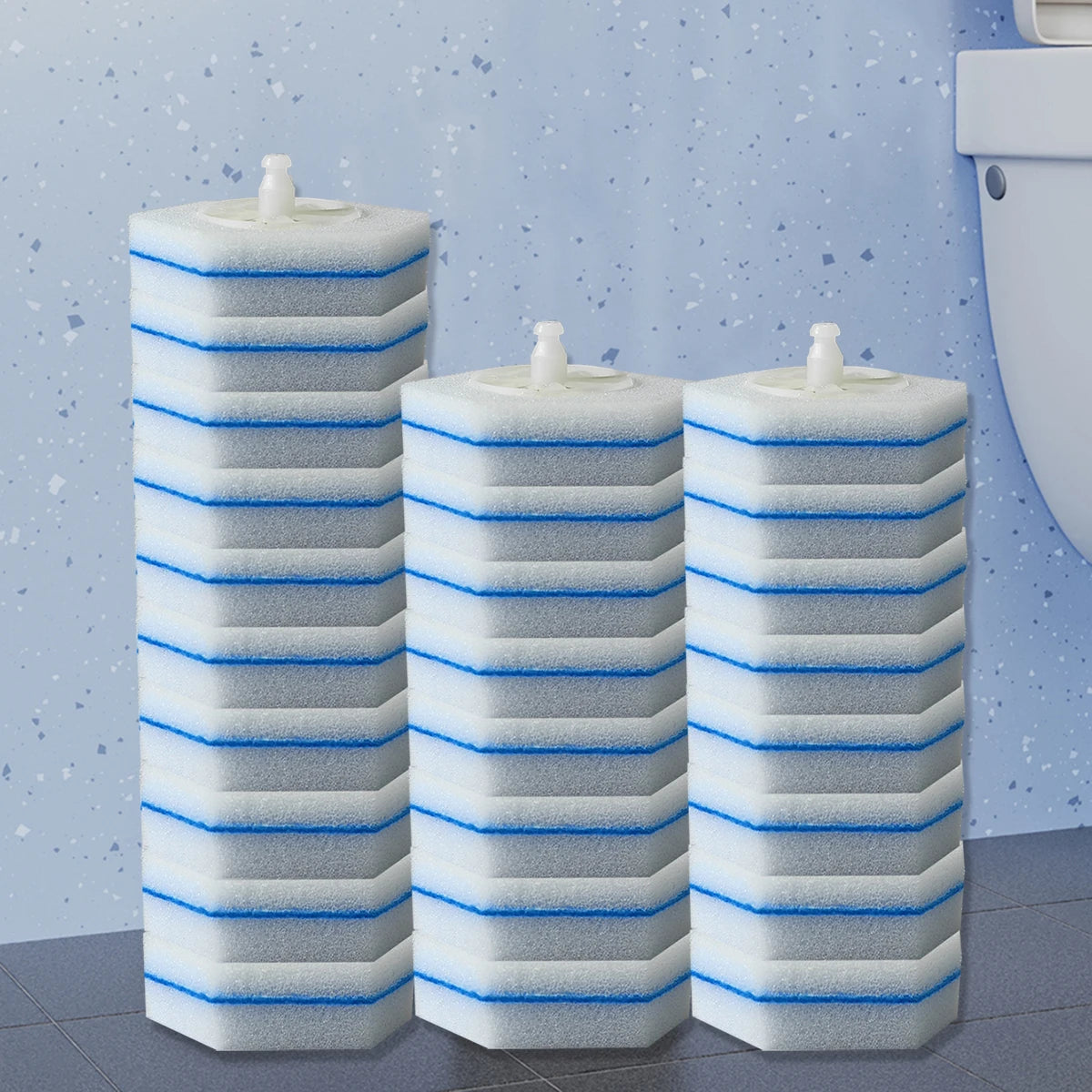 Three stacked white cleaning pads with blue accents for disposable toilet cleaning wand refills