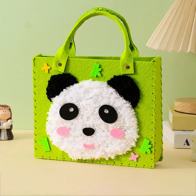 A handmade felt bag shaped like a panda face with green stitching and black and white fur details.